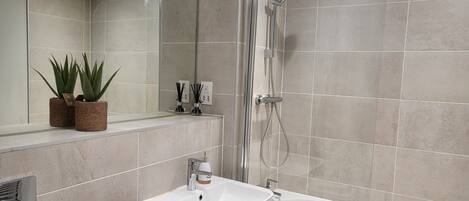 Hair dryer, towels, soap, toilet paper