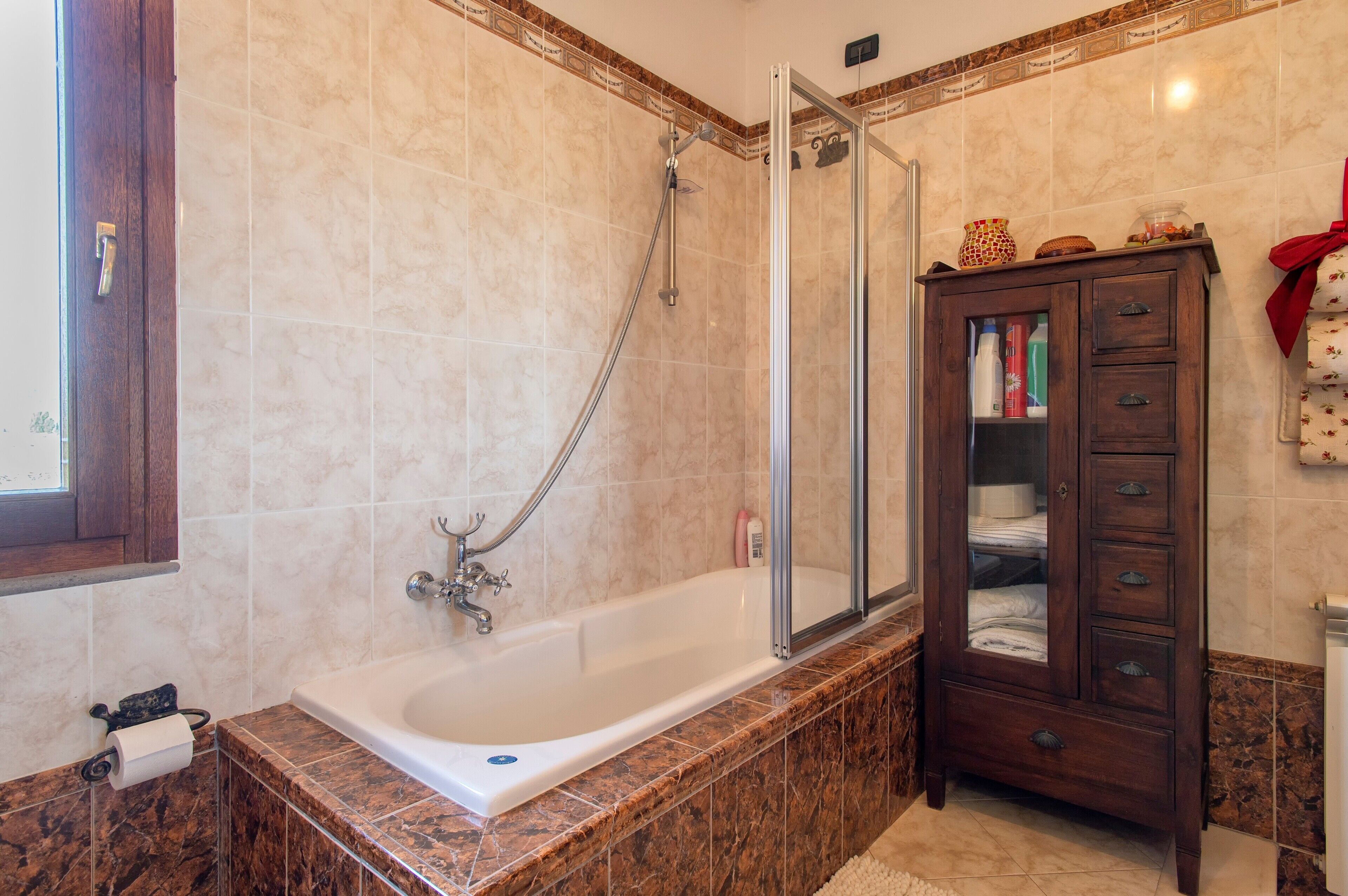 Bathtub, hair dryer, towels