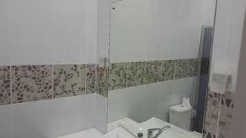 Shower, towels, soap, shampoo