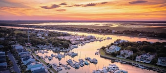 Island Escape: Luxe Home w/ Porch, Golf Course Views & Walk to Beach