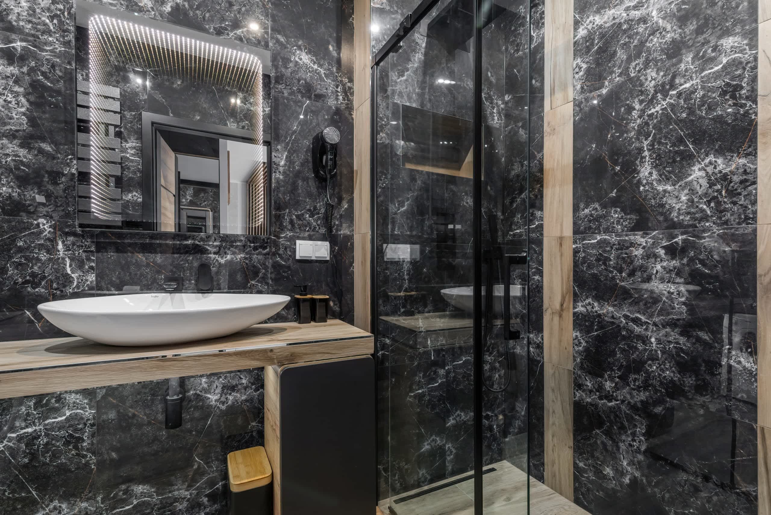 Shower, hair dryer, towels, shampoo