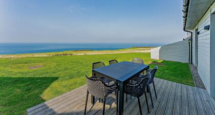 Cosy, 3-bedroom cottages with uninterrupted views of the sparkling Llyn Peninsula coastline.