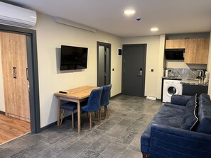 Economy Apartment | Desk, laptop workspace, soundproofing, iron/ironing board - Neo Suite Hotel (Trabzon)