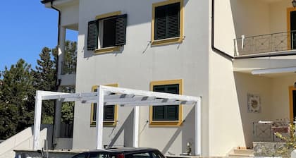 Sitauto in the center of San Nicola Arcella with breakfast included.