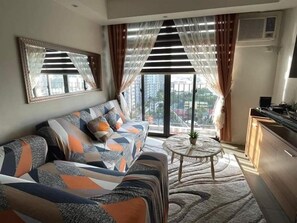 Living area - Remarkable 2-bedroom Condo Unit in Quezon City (Quezon City)