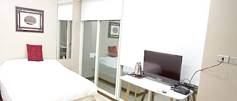 1 chambre, fer et planche à repasser, Wi-Fi gratuit, draps fournis