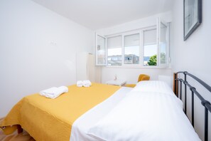 Family Apartment | 2 bedrooms, in-room safe, iron/ironing board, free WiFi