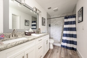 Hair dryer, towels, soap, shampoo