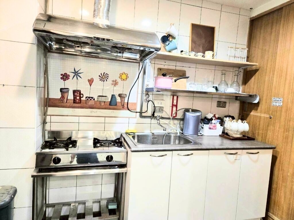 Fridge, stovetop, electric kettle, coffee grinder