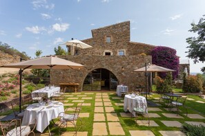 Breakfast, lunch, dinner served; Mediterranean cuisine, garden views 
