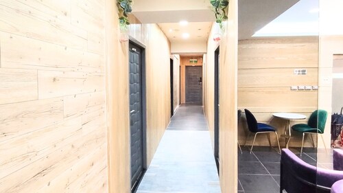 Premium City View Balcony Ensuite • Spacious Queen + Sofa Bed • 1 Min to MRT