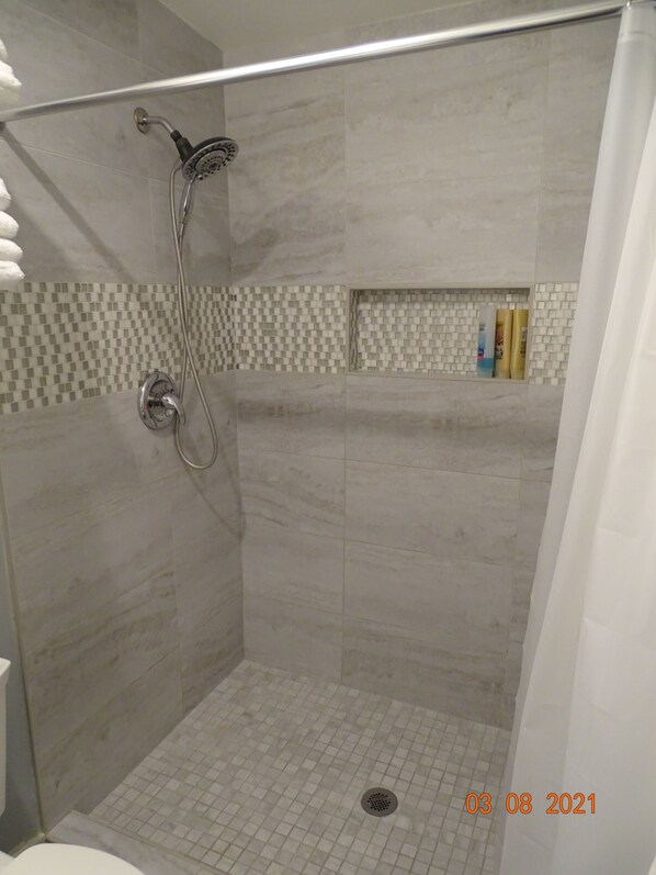 Hair dryer, towels, soap, shampoo
