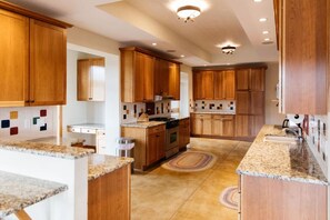 Microwave, stovetop, dishwasher, coffee/tea maker