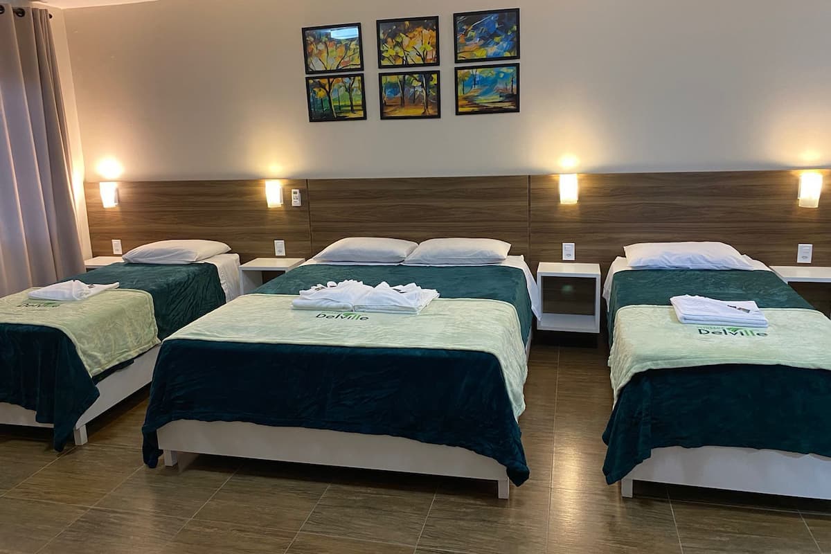 Deluxe Quadruple Room | Laptop workspace, free WiFi, bed sheets