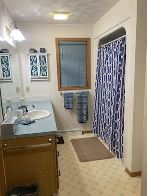Shower, towels, soap, shampoo