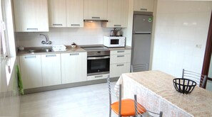 Fridge, microwave, toaster, cookware/dishes/utensils