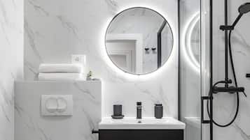 Shower, rainfall showerhead, hair dryer, towels