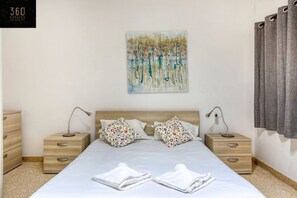 3 bedrooms, desk, iron/ironing board, travel crib