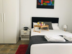2 bedrooms, desk, iron/ironing board, travel cot