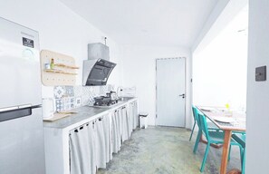 Fridge, microwave, electric kettle, cookware/dishes/utensils