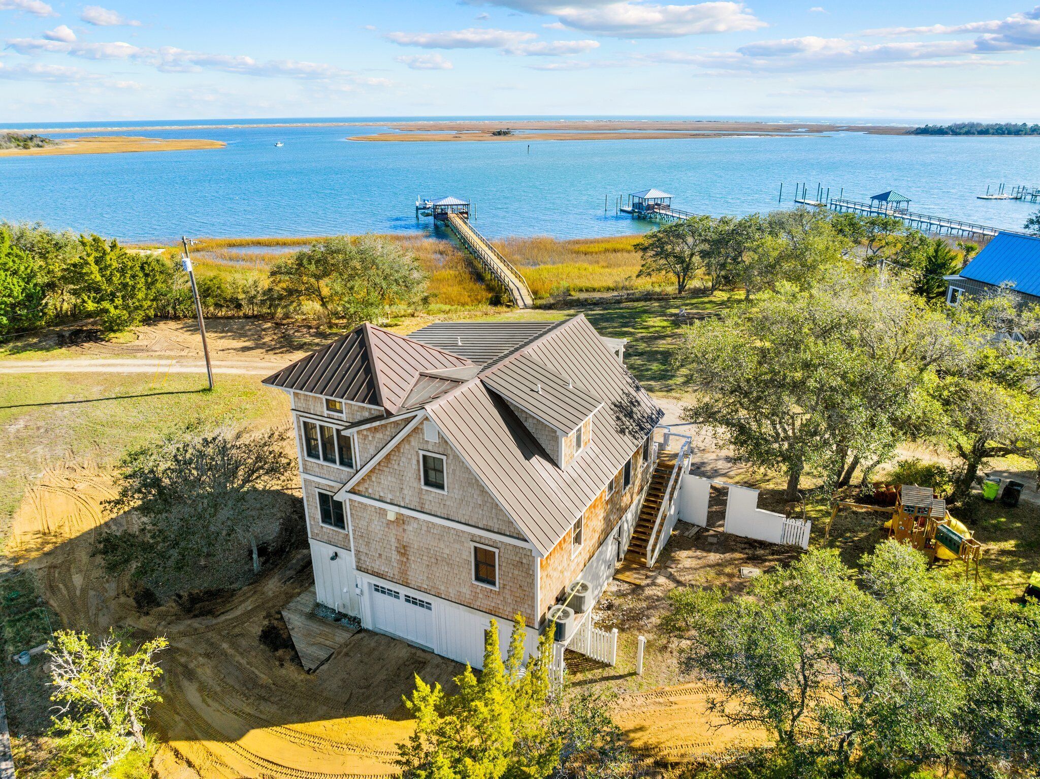 Twin Tides Intracoastal waterway cottage w/views of the ocean private dock &more