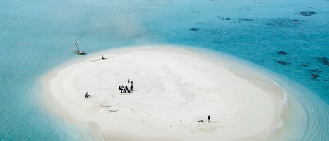 On the beach, white sand