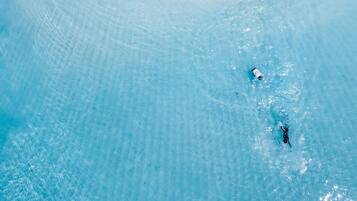 On the beach, white sand
