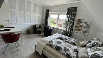 1 dormitorio, tabla de planchar con plancha, wifi gratis y ropa de cama