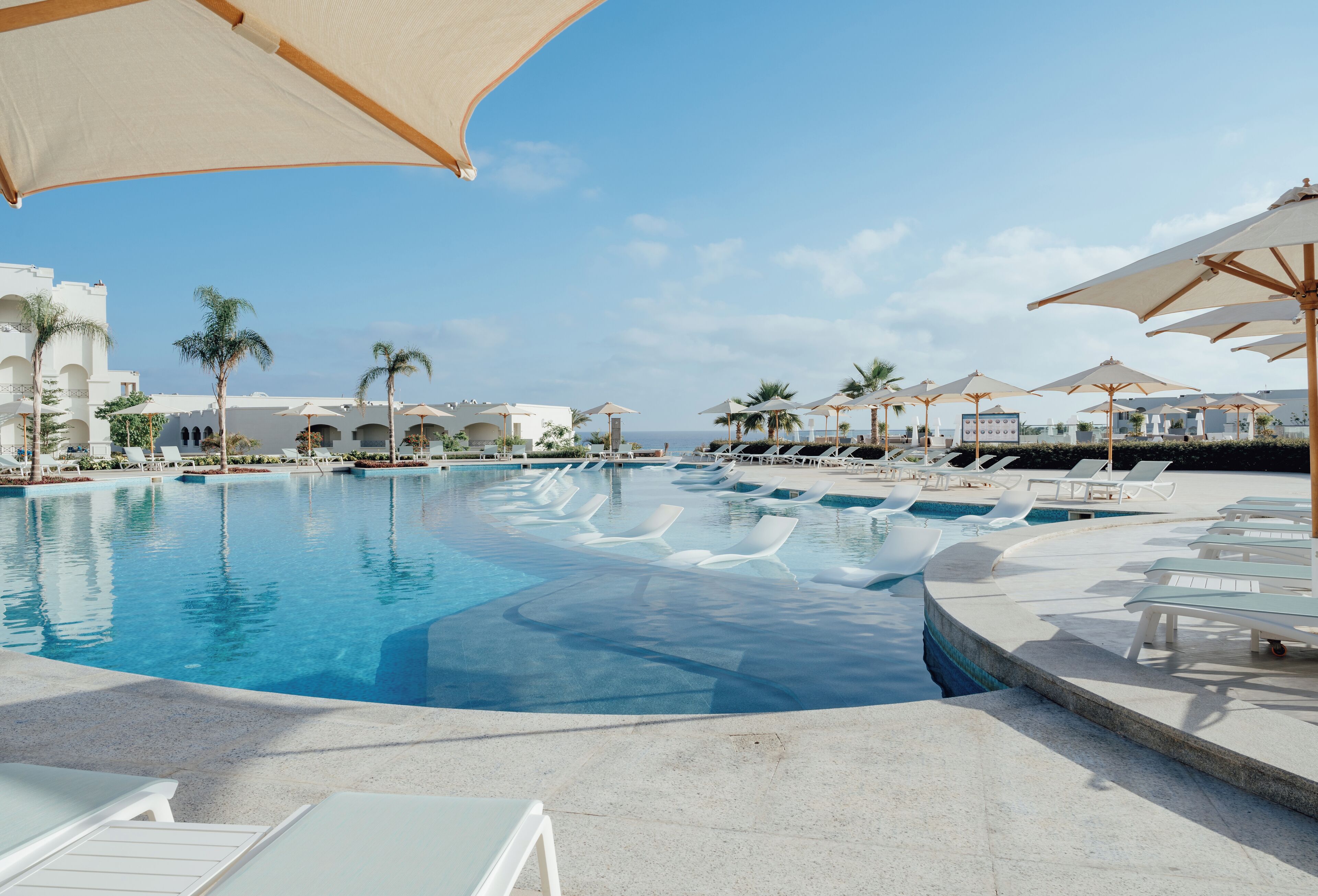 Indoor pool, 7 outdoor pools, pool umbrellas, lifeguards on site