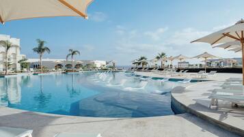 Indoor pool, 7 outdoor pools, pool umbrellas, lifeguards on site