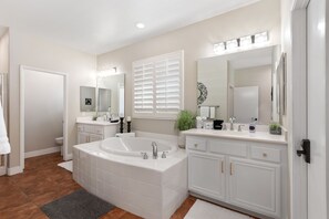 Jetted bath, hair dryer, towels, soap