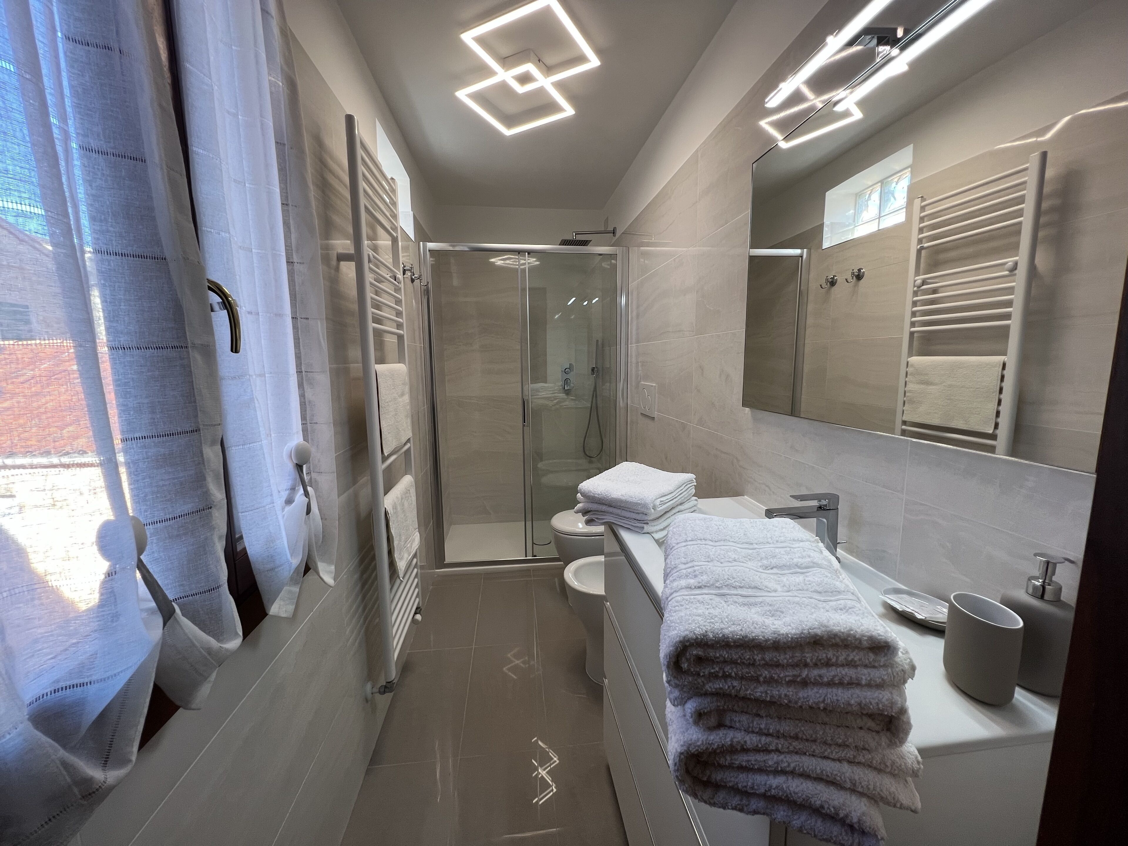 Hair dryer, towels, soap, shampoo