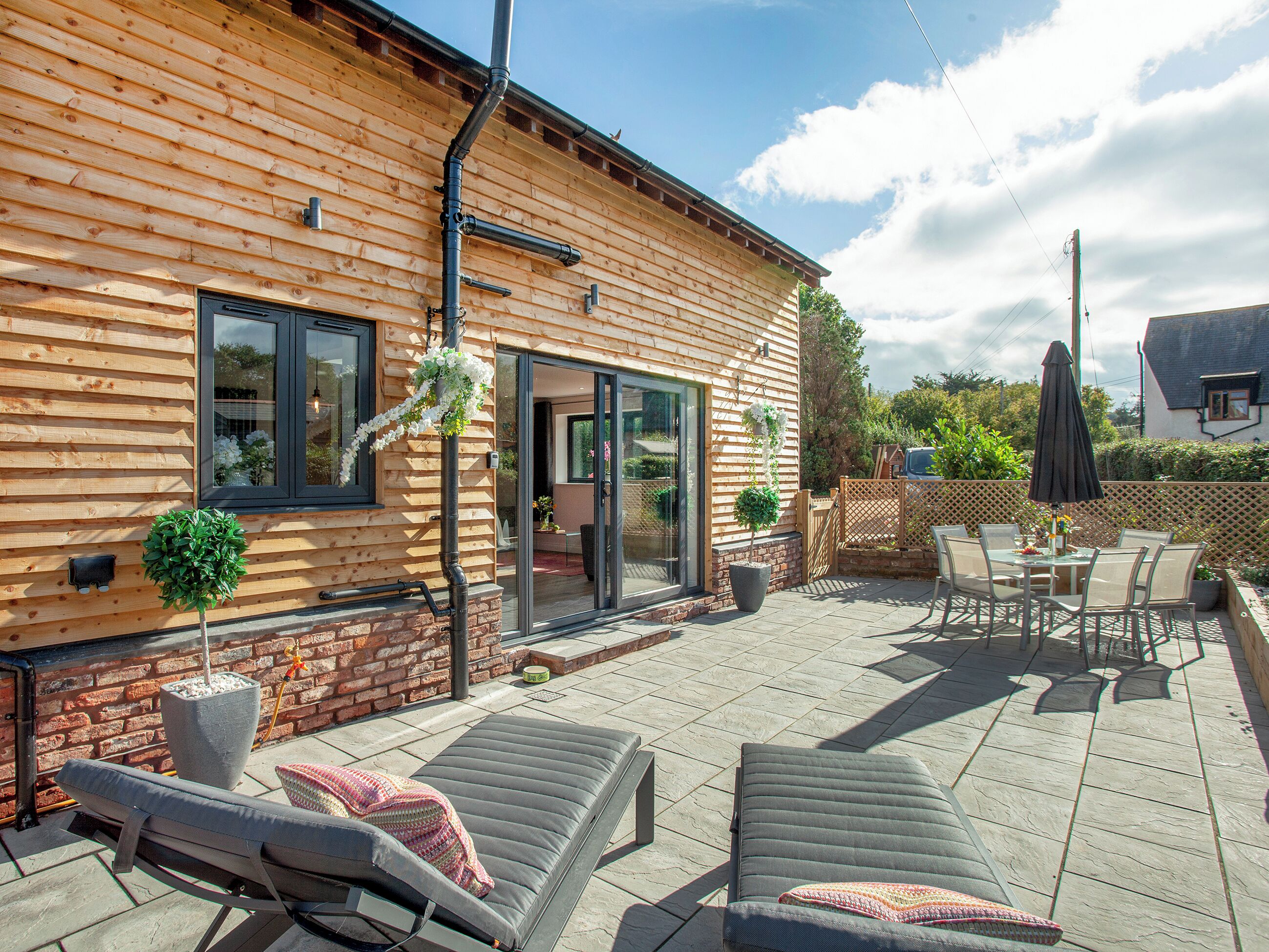 Outdoor area | Brook Cottage - Sunnyfield, Bilbrook, Minehead