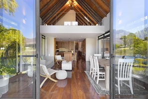 Deluxe House | Living area | 42-inch LED TV with satellite channels, TV - Lake View House (Cape Town)