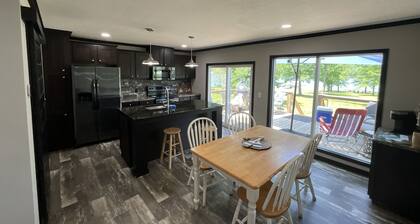 Beautiful Smith lake Home on a lazy sloping lot!!! No Stairs to the water!!!