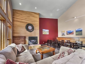 Relax in our inviting lobby, featuring a cozy seating area, fireplace, and dining space.