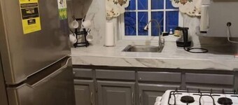 Snuggled Oasis Studio.