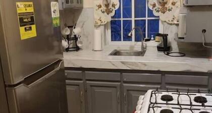 Snuggled Oasis Studio.