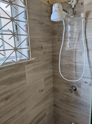 Shower, towels, toilet paper