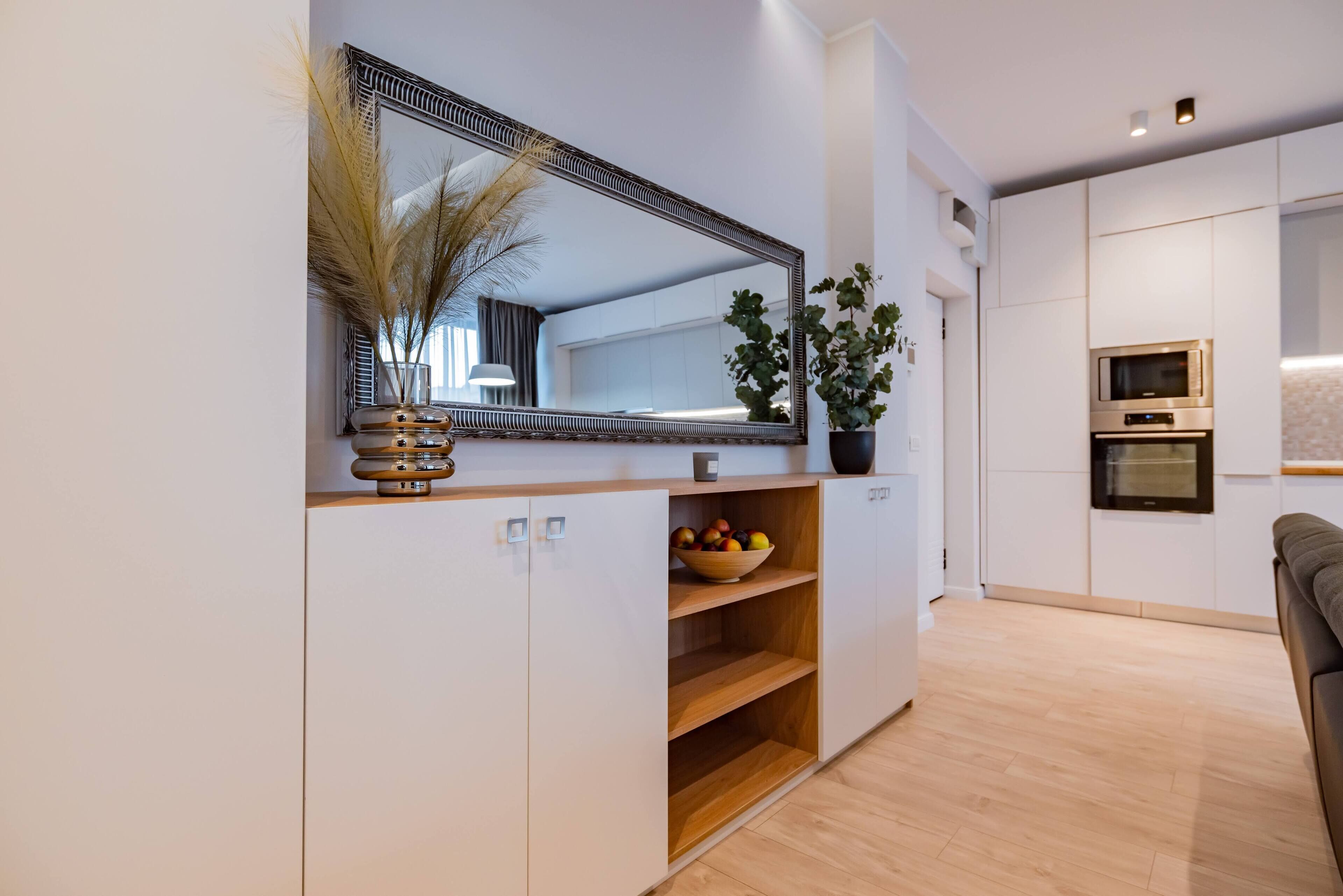 Apartamento conforto | Área de estar | Smart TV 126 cm com canais a cabo, TV