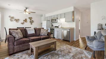 Condo, 1 King Bed with Sofa bed, Patio, Garden View (3 Bears Hideaway ) | Living area | 50-inch flat-screen TV with digital channels, fireplace