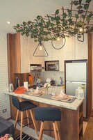 Full-size fridge, microwave, stovetop, electric kettle