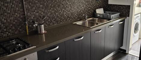 Fridge, cleaning supplies, paper towels