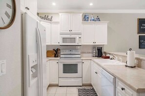 Condo, Multiple Beds, Patio, Garden View (Kings Hideaway ) | Private kitchen | Coffee/tea maker