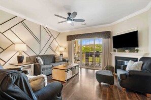 Condo, Multiple Beds, Patio, Garden View (Kings Hideaway ) | Living area | 50-inch flat-screen TV with digital channels, fireplace