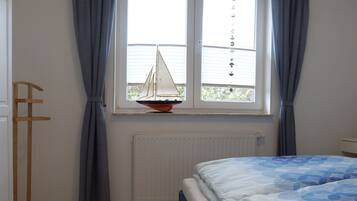 1 dormitorio, cuna de viaje, wifi gratis y ropa de cama