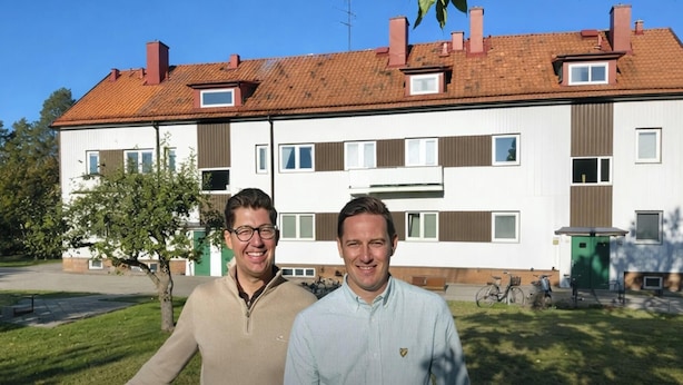 A two-story residential building with a tiled roof, multiple windows, and a visible trash bin. - Prinshöjden Hotel - Apartments & Villas (Katrineholm)