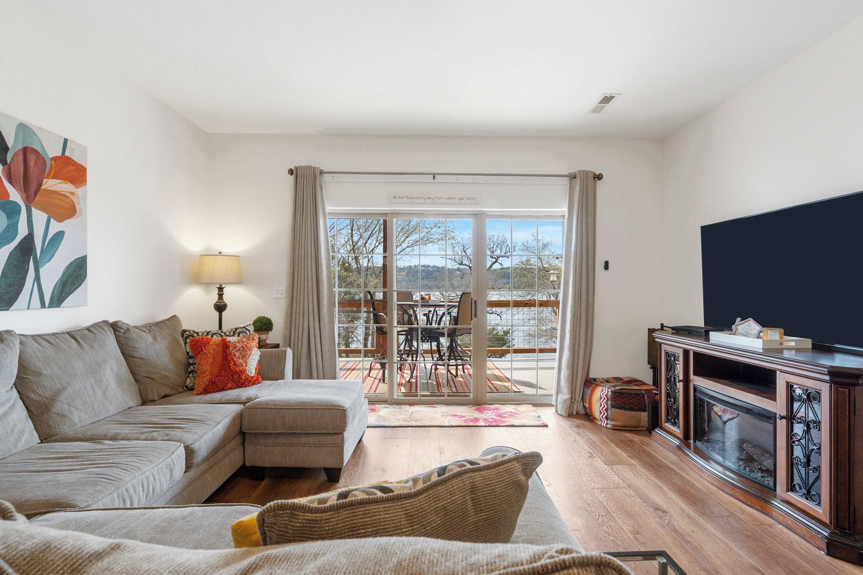 Condo, Multiple Beds, Balcony (Lakefront Sanctuary II ) | Living area | 42-inch flat-screen TV with digital channels, fireplace