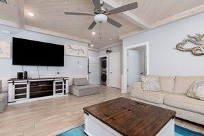 Townhome, Multiple Beds, Balcony (Norty's Paradise) | Living area | 65-inch flat-screen TV with digital channels
