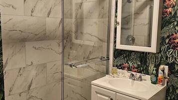 Hair dryer, towels, soap, shampoo